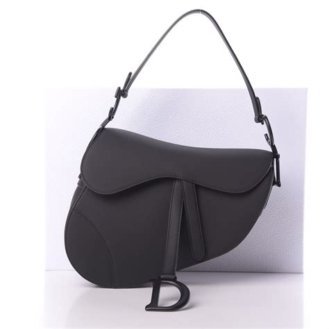 christian dior black saddle bag.